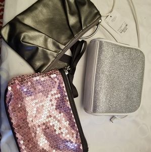 3 small clutch and carry bags